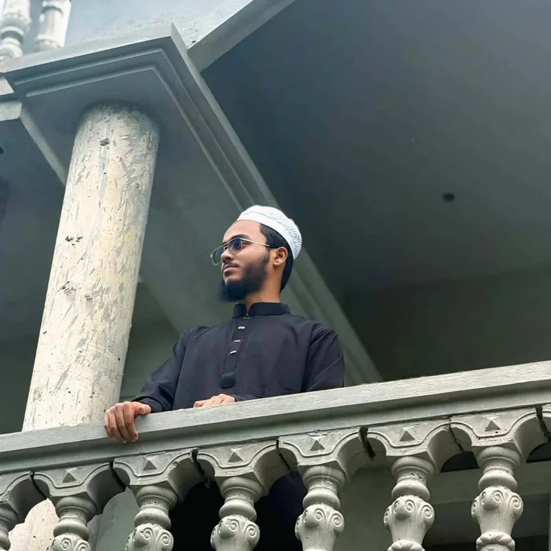 Nayem Hasan, founder of Twoditor, on a balcony